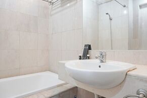 Elegant and Comfy 1BR with Extra Room Apartment at Bellagio Residence