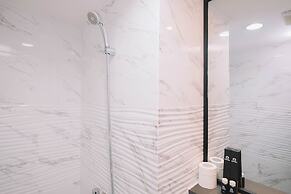 Simple and Cozy Living 2BR at Podomoro Golf View Apartment