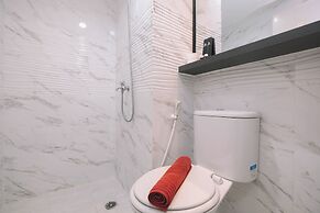 Simple and Cozy Living 2BR at Podomoro Golf View Apartment