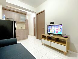 Tidy and Warm 2BR at Podomoro Golf View Apartment