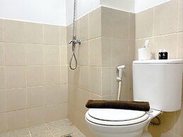 Tidy and Warm 2BR at Podomoro Golf View Apartment