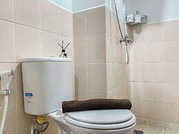 Warm and Homey Studio at Podomoro Golf View Apartment