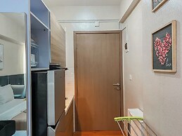 Warm and Homey Studio at Podomoro Golf View Apartment