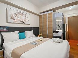 Warm and Homey Studio at Podomoro Golf View Apartment