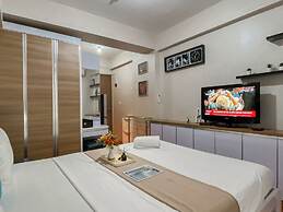 Warm and Homey Studio at Podomoro Golf View Apartment