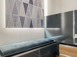 Warm and Homey Studio at Podomoro Golf View Apartment