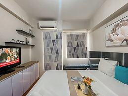 Warm and Homey Studio at Podomoro Golf View Apartment