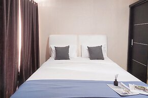 Spacious and Homey Studio Room Paramount Skyline Apartment