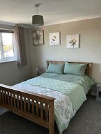 Cozy Coastal Retreat in Colwyn bay Sleeps 8