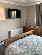 Cozy Coastal Retreat in Colwyn bay Sleeps 8