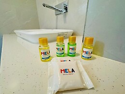 Mela By Half