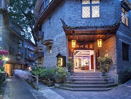 Qixin Xianting Hotel