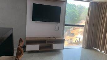 Flat confortável no Tropical Executive