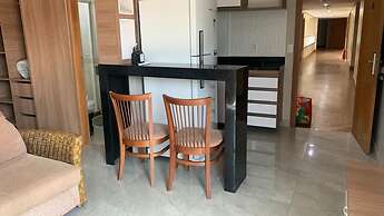 Flat confortável no Tropical Executive