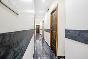 Fabhotel Riza International