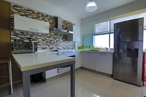 Spacious Condo with Gym & Pool Cancun