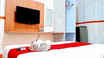 Capital O 94359 Aurora Guest House