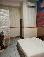 Capital O 94359 Aurora Guest House