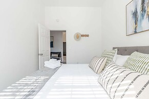 Elegant Retreat Modern Comforts Prime Location