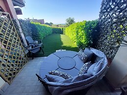 Red Villa With Shared Pool and Private Garden is the new Black on Lake