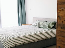 Apartmentsleep5-balcony-bqq-garden-pool