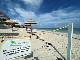 NEW Stunning Beachfront Condo at the Coral Beach