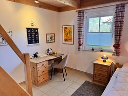 Ferienhaus mit Kaminofen in Burhave