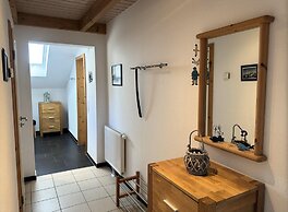 Ferienhaus mit Kaminofen in Burhave