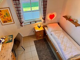 Ferienhaus mit Kaminofen in Burhave