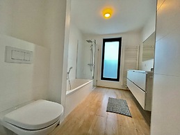 Modern 2BR 1.5 BA Near Diamond District by Oneluxstay