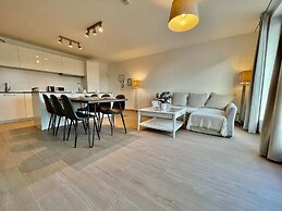 Modern 2BR 1.5 BA Near Diamond District by Oneluxstay