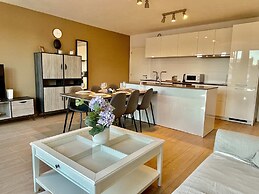 Modern 2BR 1.5 BA Near Diamond District by Oneluxstay