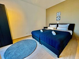 Modern 2BR 1.5 BA Near Diamond District by Oneluxstay