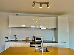 Modern 2BR 1.5 BA Near Diamond District by Oneluxstay