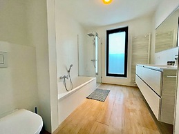 Modern 2BR 1.5 BA Near Diamond District by Oneluxstay