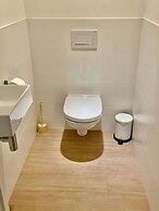 Modern 2BR 1.5 BA Near Diamond District by Oneluxstay