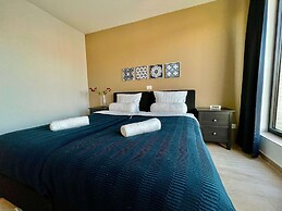 Modern 2BR 1.5 BA Near Diamond District by Oneluxstay