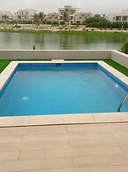Peaceful 2-bedroom Pool Escape