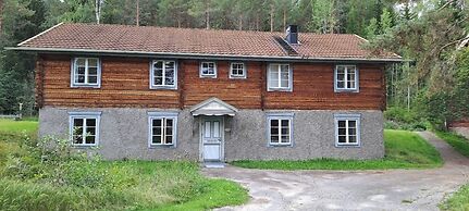 Skålsjögården Timber Lodge