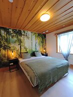 Skålsjögården Timber Lodge