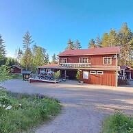 Skålsjögården Timber Lodge
