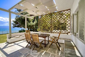 Salt Stone Beach Front Retreat by Estia