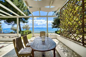 Salt Stone Beach Front Retreat by Estia