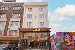 Tyche Boutique & Suites