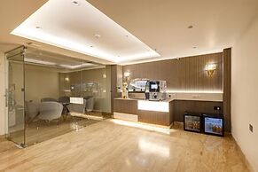 Tyche Boutique & Suites