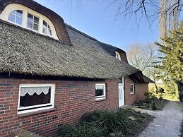 Ferienwohnung im Reetdachhaus, Burhave