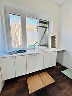 Maison proche rivière avec jardin