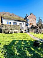 Maison proche rivière avec jardin