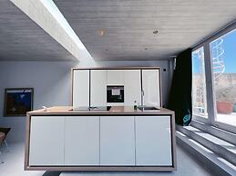 Spacious 1BR Penthouse With a Rooftop Terrace