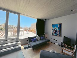 Spacious 1BR Penthouse With a Rooftop Terrace
